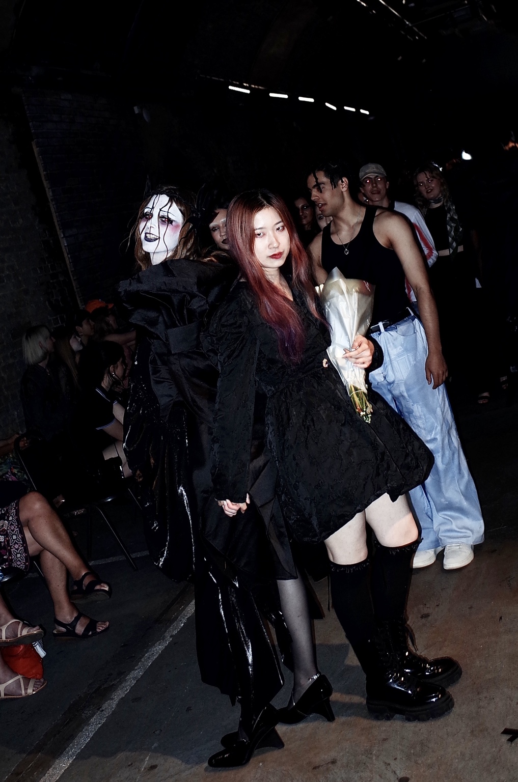 Noir Show, participants emerging together after the runway
