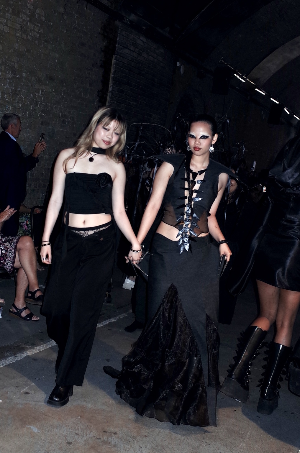 Noir Show, designer and model sharing the runway