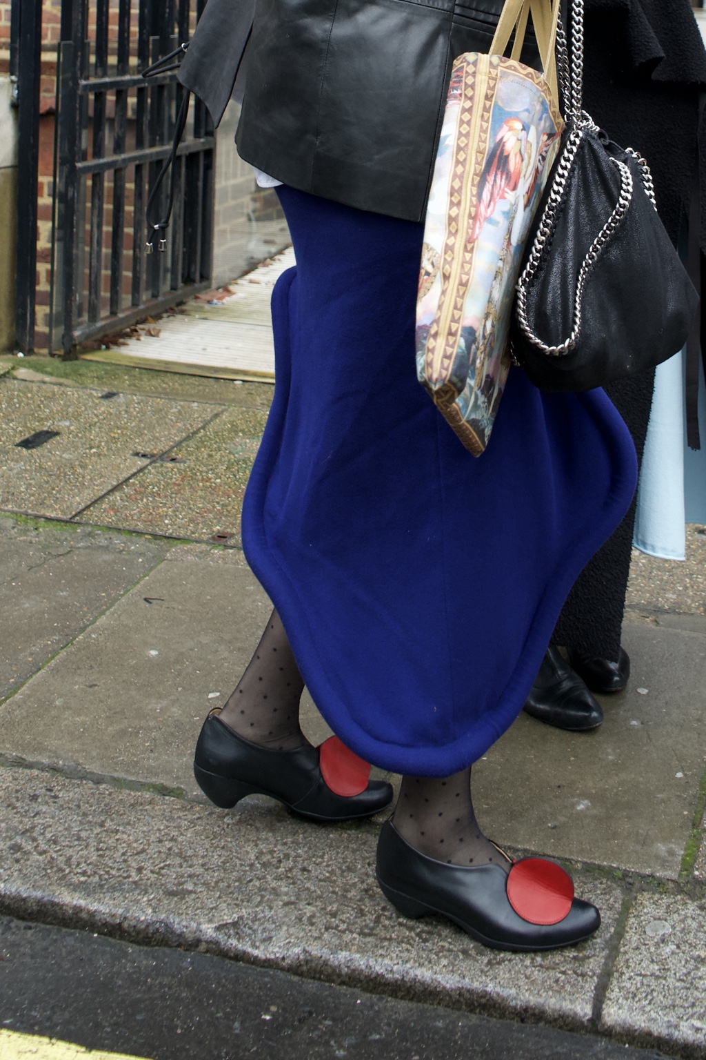 Clothing, shoes and bags outside the LOEWE show, London, 18 February 2024